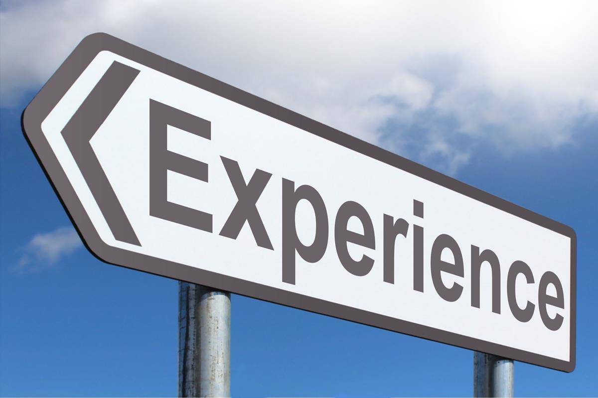 A road sign that reads 'experience'.