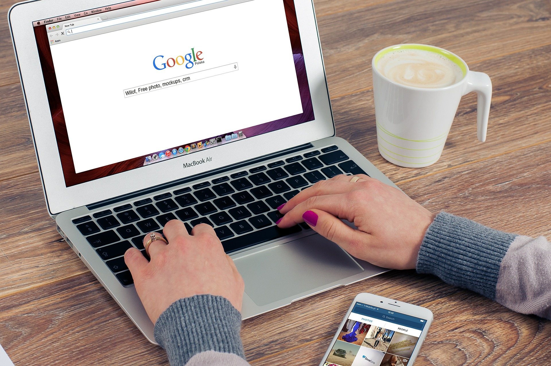 Someone using Google search on a laptop.